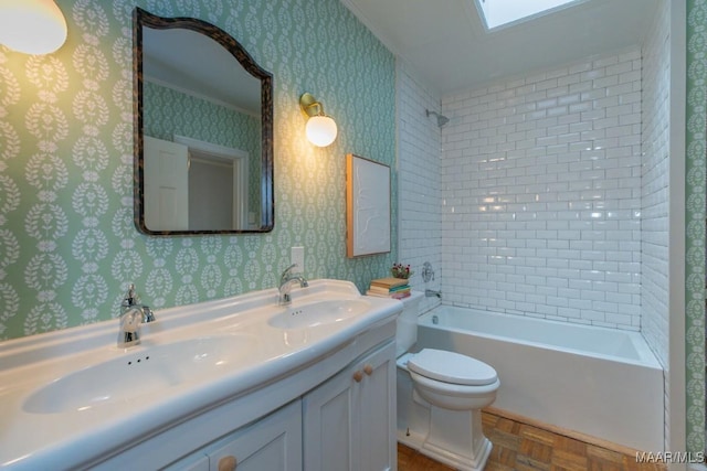 bathroom featuring shower / bath combination, a skylight, a sink, and wallpapered walls