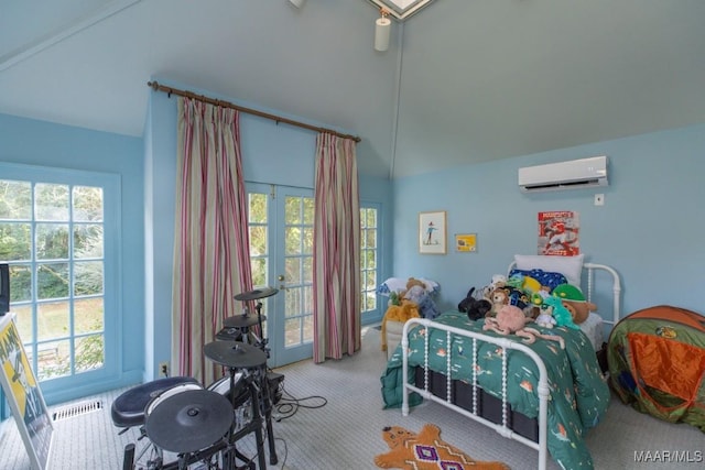 bedroom with lofted ceiling, carpet floors, an AC wall unit, access to outside, and french doors