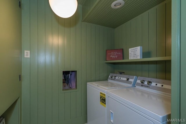 laundry room featuring laundry area and washing machine and clothes dryer