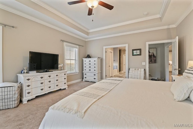 bedroom with light carpet, a ceiling fan, a raised ceiling, and crown molding