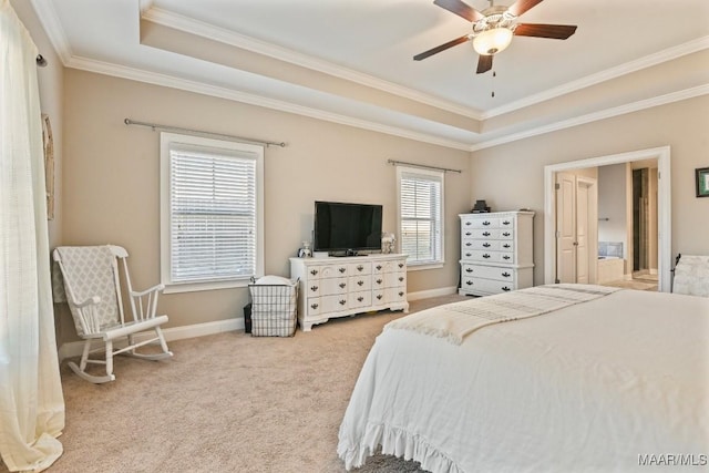 bedroom with a raised ceiling, ornamental molding, a ceiling fan, light carpet, and baseboards