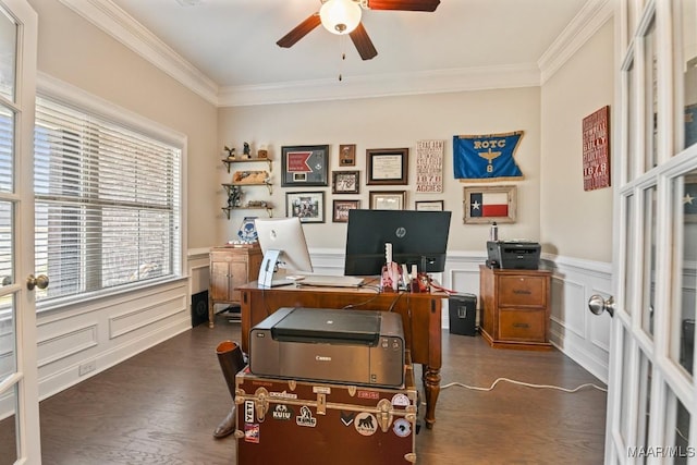 office area with a ceiling fan, a wainscoted wall, crown molding, and dark wood finished floors