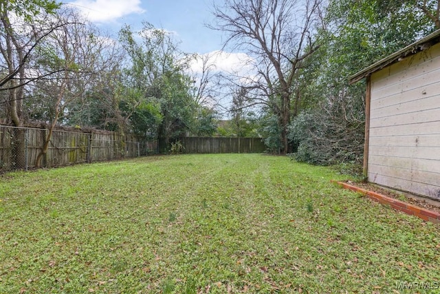 view of yard featuring a fenced backyard