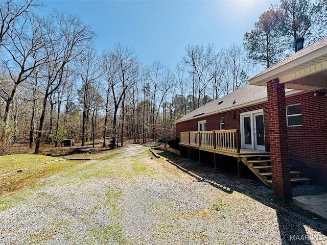 view of road featuring driveway