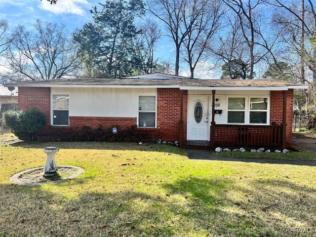 single story home with brick siding and a front lawn