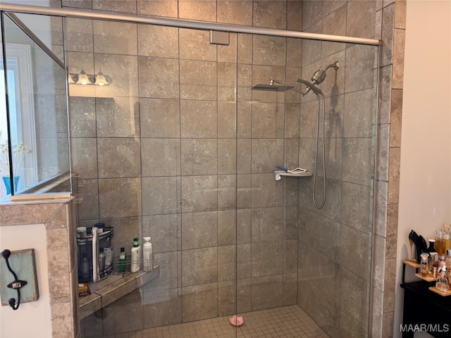 full bath with a shower stall