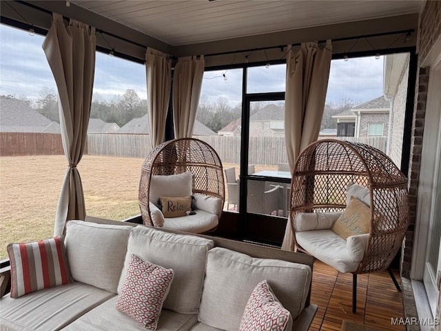 sunroom featuring a healthy amount of sunlight