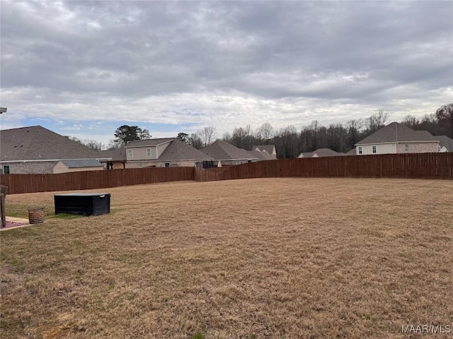 view of yard with fence