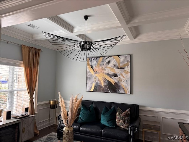 living area with visible vents, coffered ceiling, and beamed ceiling