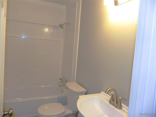 full bathroom with shower / bath combination, toilet, and a sink