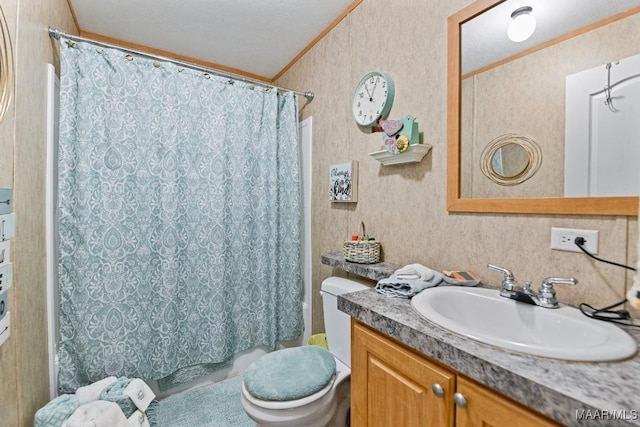 bathroom featuring ornamental molding, vanity, toilet, and wallpapered walls