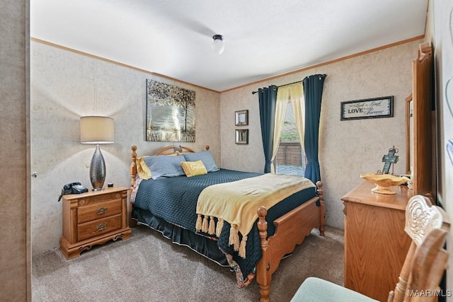 bedroom with crown molding and light colored carpet