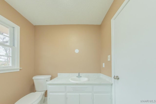 half bath with toilet and vanity