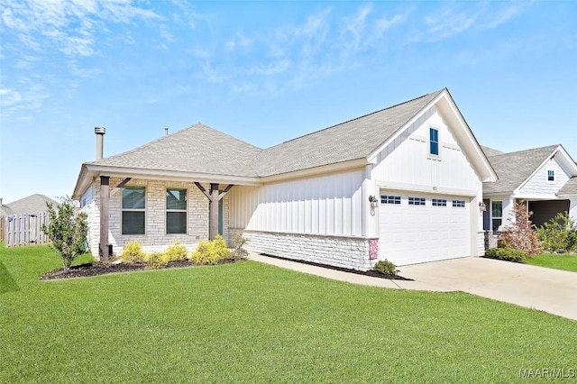 view of front of home featuring stone siding, concrete driveway, board and batten siding, and a front yard