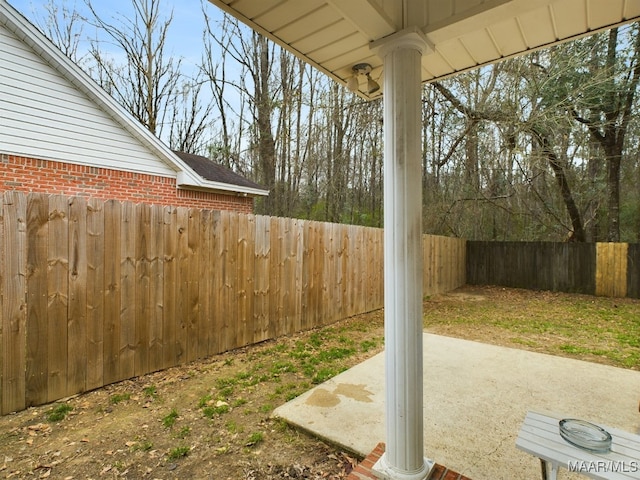 view of yard featuring a fenced backyard and a patio