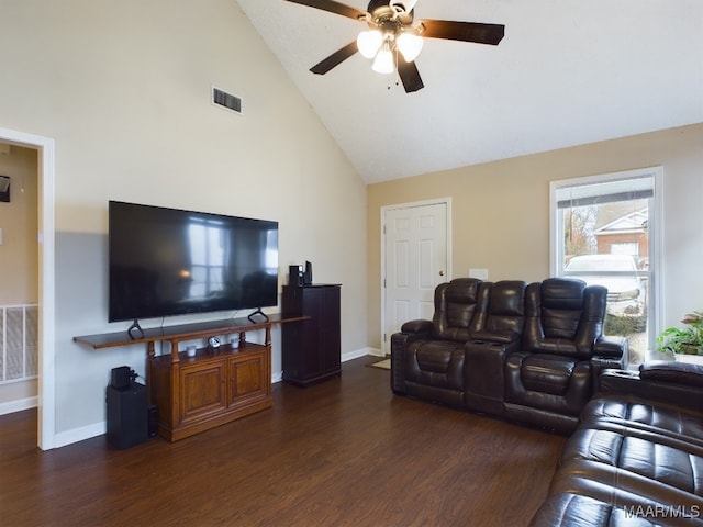 living room featuring dark wood-type flooring, visible vents, baseboards, and a ceiling fan