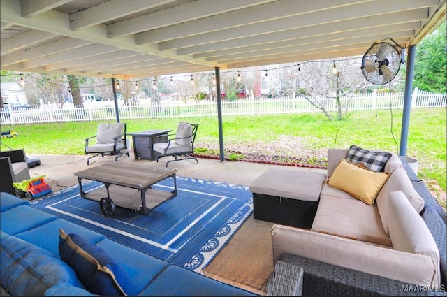 view of patio featuring an outdoor hangout area and a fenced backyard