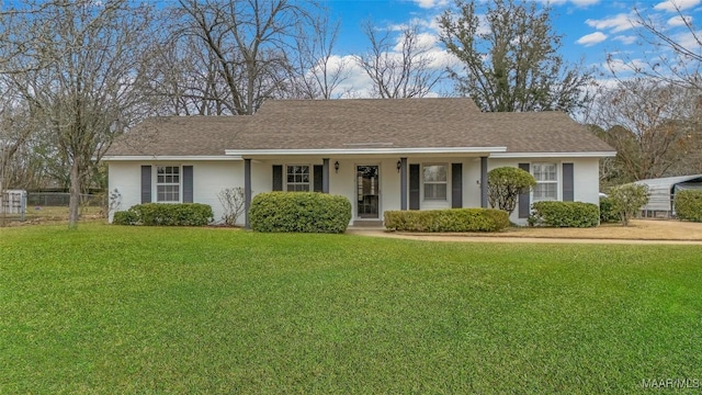 single story home with a shingled roof and a front lawn