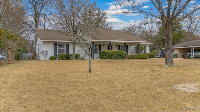 ranch-style house with a front lawn and stucco siding