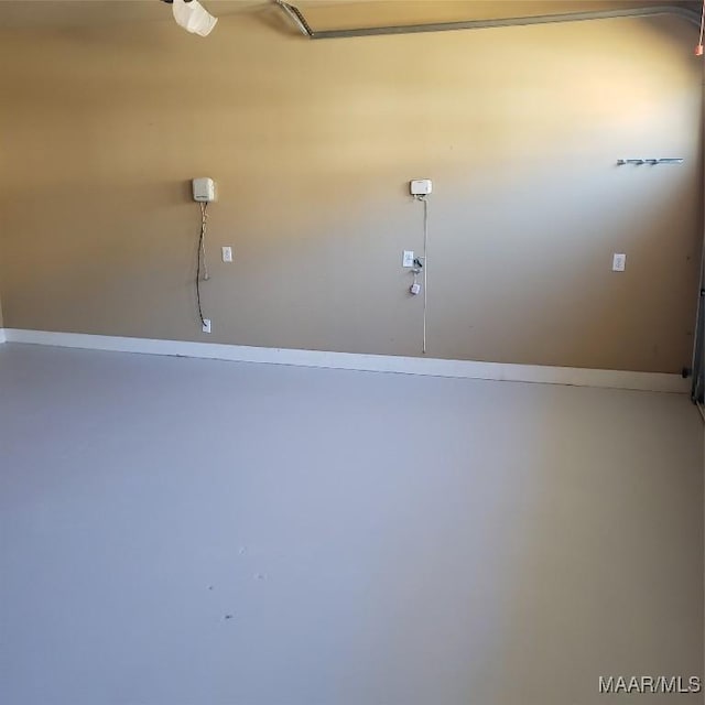 garage with baseboards