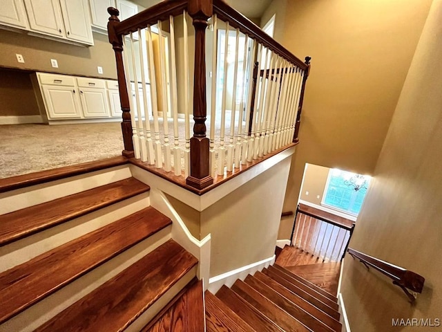 stairway with baseboards