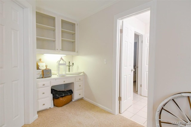 office featuring light carpet and baseboards