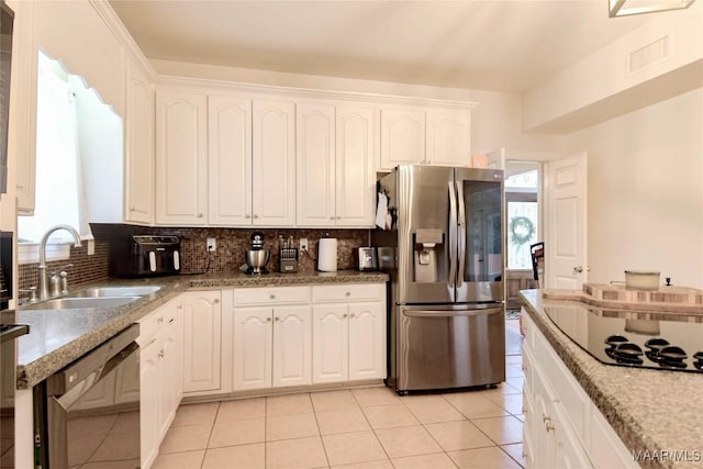 kitchen featuring black appliances, visible vents, white cabinetry, and a sink