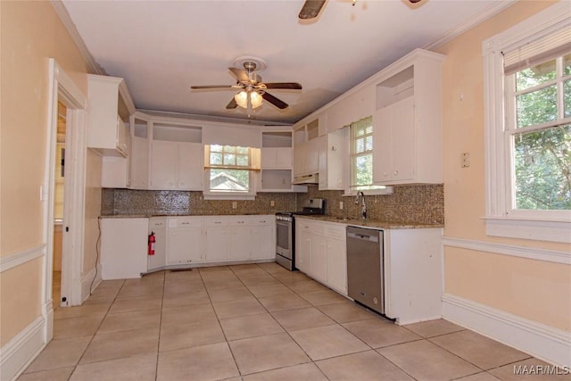 kitchen with under cabinet range hood, white cabinetry, appliances with stainless steel finishes, and ceiling fan