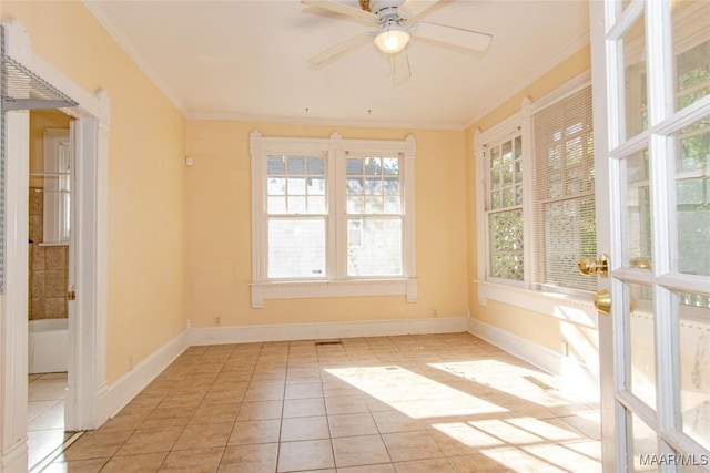 unfurnished sunroom with a ceiling fan