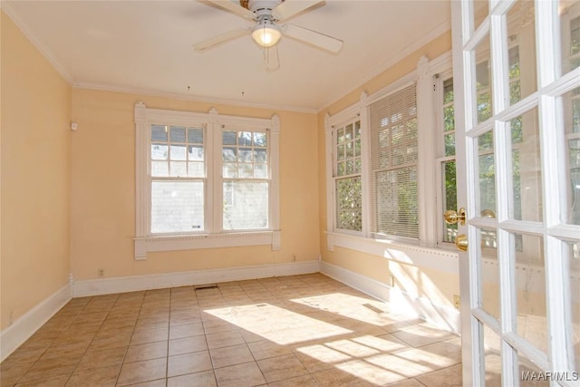 unfurnished sunroom featuring visible vents and ceiling fan