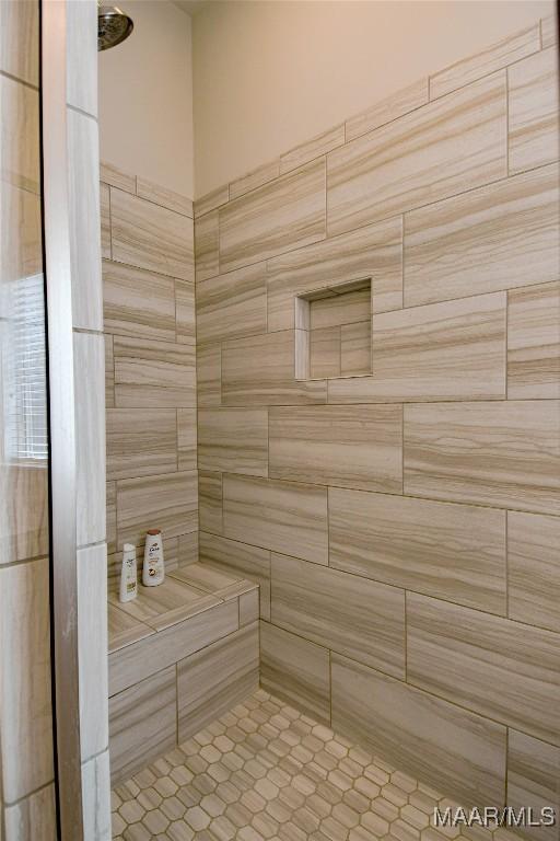 full bath featuring a sauna and tiled shower