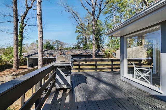 wooden terrace with grilling area