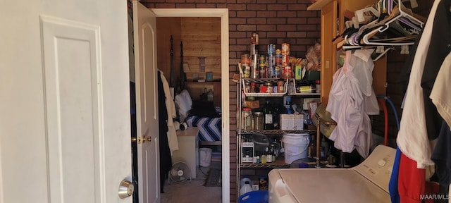 storage room featuring washer / dryer