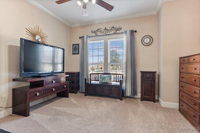 living area with a ceiling fan, light carpet, crown molding, and baseboards