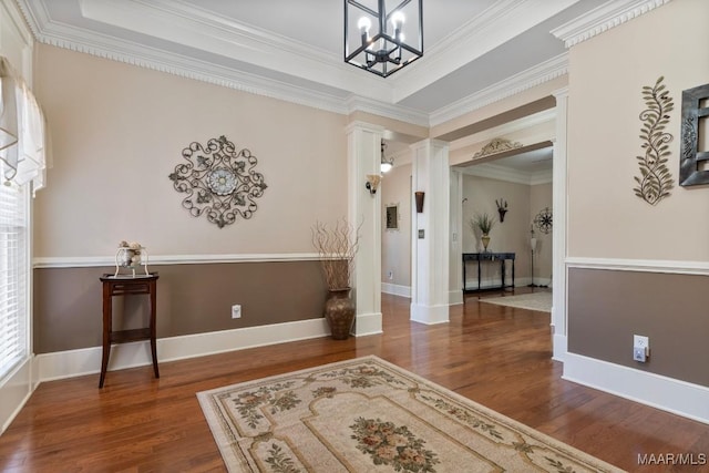 interior space with dark wood-type flooring and crown molding