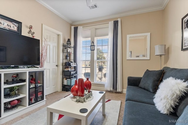 living area with light colored carpet, a healthy amount of sunlight, and crown molding