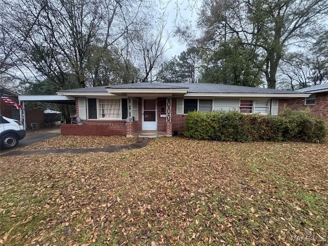 3819 Bienville Rd, Montgomery, AL 36109 - single story home featuring a carport, brick siding, and driveway