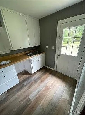 4325 Zorn Ln, Montgomery, AL 36116 - washroom featuring wood finished floors and a sink