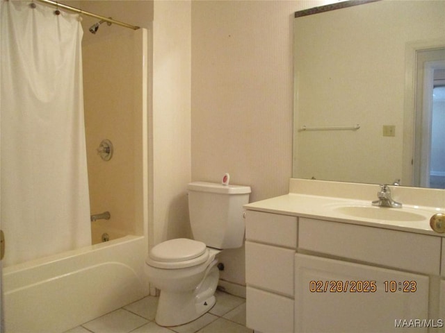 bathroom with tile patterned flooring, shower / tub combo with curtain, vanity, and toilet