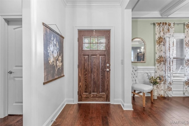 entryway featuring dark wood finished floors, crown molding, and baseboards