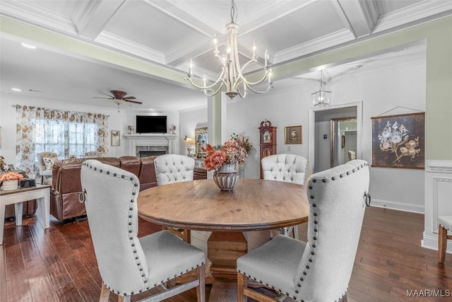 dining area featuring dark wood-style floors, a fireplace, coffered ceiling, and beamed ceiling