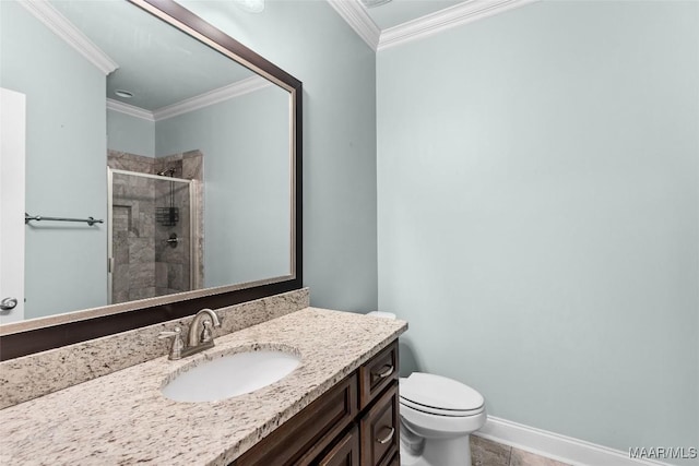 full bathroom with toilet, ornamental molding, a stall shower, vanity, and baseboards