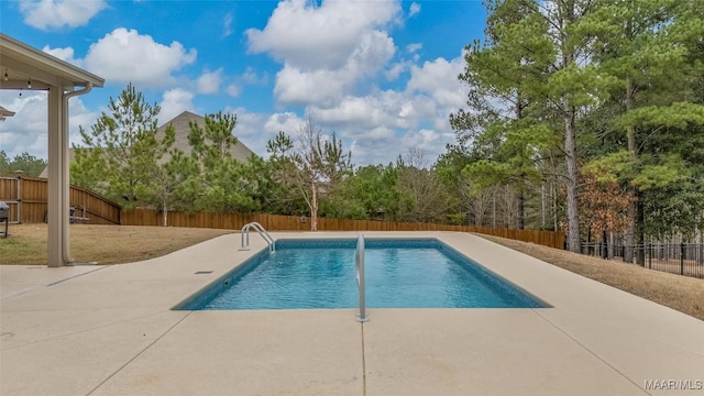 view of swimming pool with a fenced in pool, a patio area, and a fenced backyard