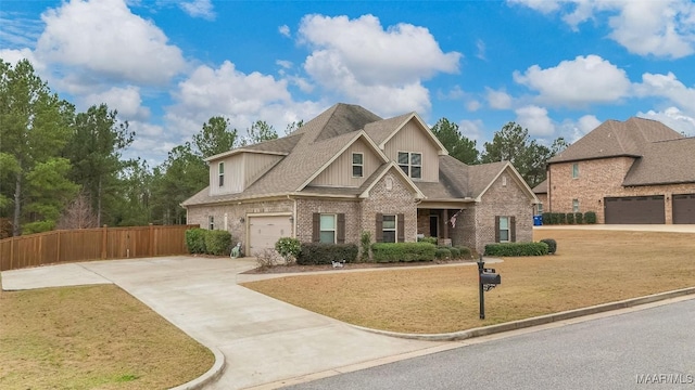 craftsman house with a shingled roof, concrete driveway, fence, a front lawn, and brick siding