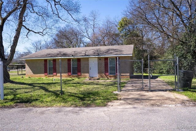 ranch-style home featuring brick siding, a fenced front yard, a front yard, and a gate