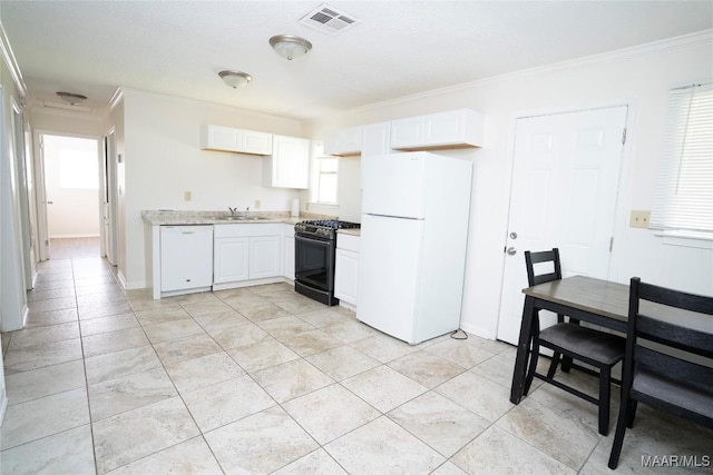 kitchen featuring white appliances, visible vents, white cabinets, and ornamental molding