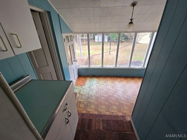 view of unfurnished sunroom