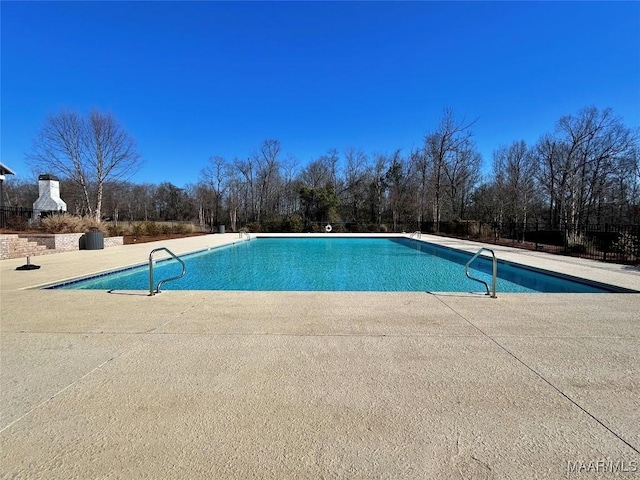 community pool with a patio