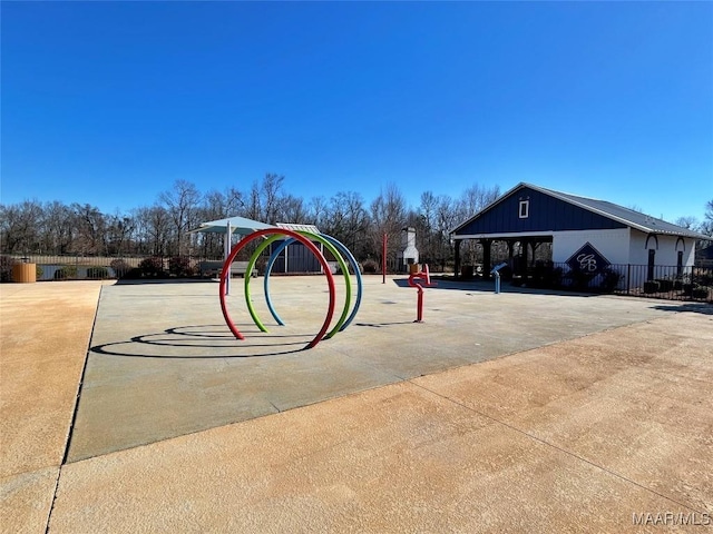 exterior space featuring fence and playground community