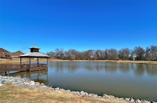 dock area featuring a gazebo and a water view